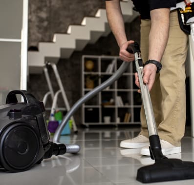 Man doing a vacuum cleaning